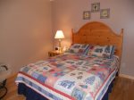 The master bedroom is on the main floor with a Queen bed, chest of drawers and private full bath.